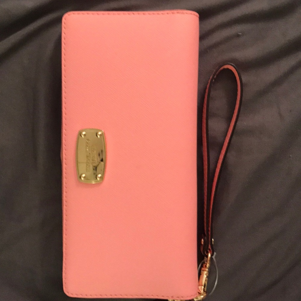 Authentic Michael Kors brand new wristlet wallet